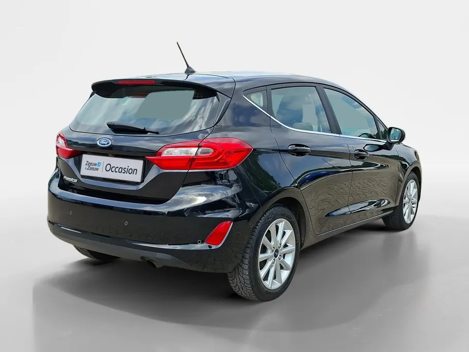 Ford Fiesta 1.0 EcoBoost Titanium | Dealeronderhouden | First edition pack | Adaptieve cruise control | Voorruitverwarming | Parkeer sensoren
