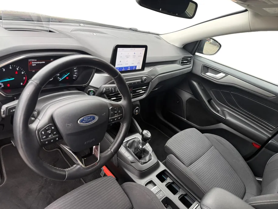 Ford Focus Wagon 1.0 EcoBoost Titanium Business | Trekhaak | HUD | Achteruitrijcamera | Winter Pack | Dodehoek detectie | Elektr. Achterklep | 12 maanden garantie! |