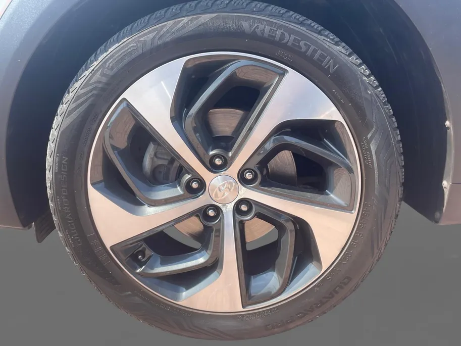 Hyundai Tucson 1.6 T-GDi Premium 4WD | STOEL VERWARMING | SCHUIFKANTELDAK | CAMERA | NAVIGATIE | ELEKTRISCHE STOEL |