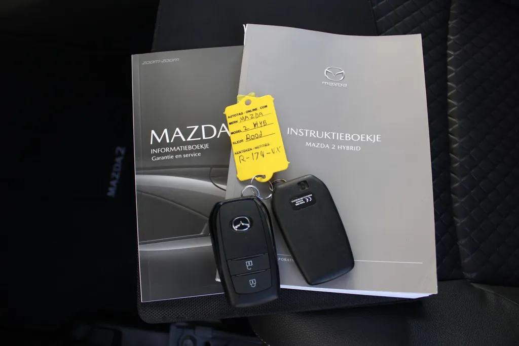 Mazda 2 Hybrid 1.5 Select | Airco | Navi | Cruise | PDC | Head-up display | Camera |