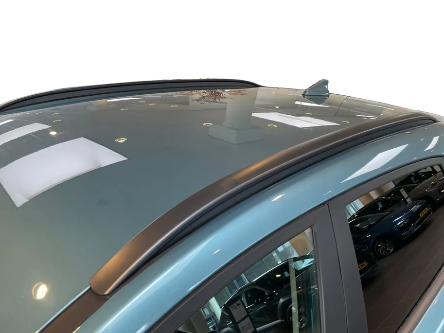 Hyundai Kona EV Fashion 64 kWh | 100% SOH | Warmtepomp | Navigatie | Apple Carplay & Android Auto | Adaptive cruise control | Climate control | Head-up display | Parkeersensoren achter |