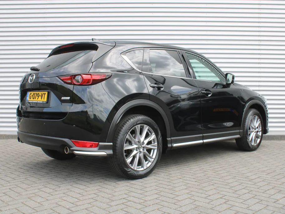 Mazda CX-5 2.0 SkyActiv-G 6AT 165PK Business Luxury | Stuur-/stoelverwarming + ventilatie | Geheugenstoel | 360 Camera | HUD | Leer | 19" LM | Dodehoek detectie | Bose |