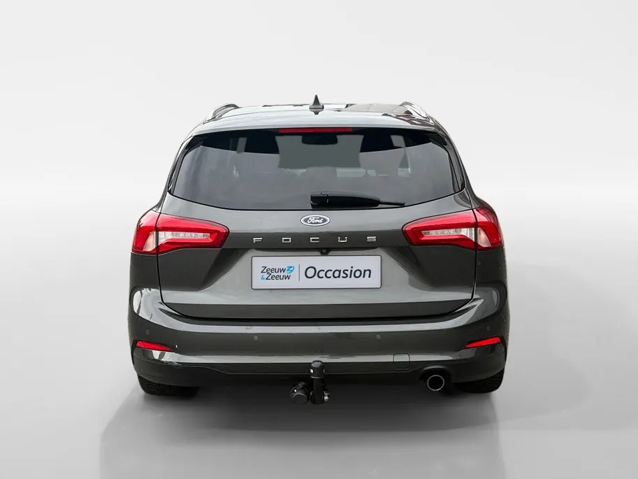 Ford Focus Wagon 1.0 EcoBoost Titanium Business | Trekhaak | HUD | Achteruitrijcamera | Winter Pack | Dodehoek detectie | Elektr. Achterklep | 12 maanden garantie! |