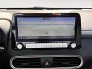 Hyundai Kona EV Fashion 64 kWh 204PK | Warmtepomp | SOH 100 % | Navigatie | Apple Carplay & Android Auto | Adaptive cruise control | Climate control | Head-up display | Parkeersensoren achter | Trekhaak |