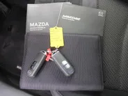 Mazda 2 1.5 Skyactiv-G GT-M | Trekhaak | Camera | Stoelverwarming | 16' LM | Navi | Cruise | Clima | Dodehoek detectie | LED | HUD |