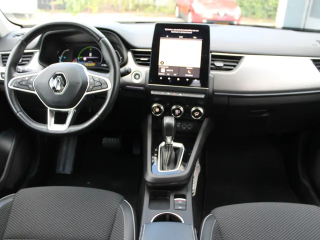Renault Arkana 1.6 E-Tech Hybrid 145 PK Intens | Elektrisch bedienbare trekhaak | Camera achter | Bose geluid | Groot scherm | Reservewiel | Dode hoek sensoren | Adaptieve cruise controle |