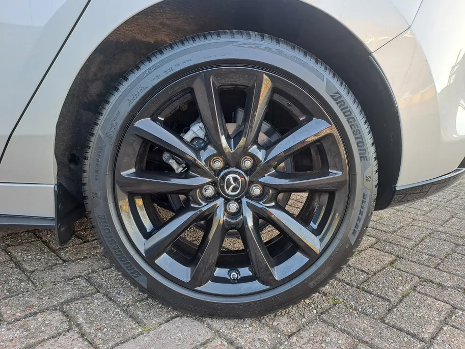 Mazda 3 2.0 e-SkyActiv-X M Hybrid 186 Nagisa | 18' LM | Navigatiesysteem full map | Cruise  | Camera  | Half Leer