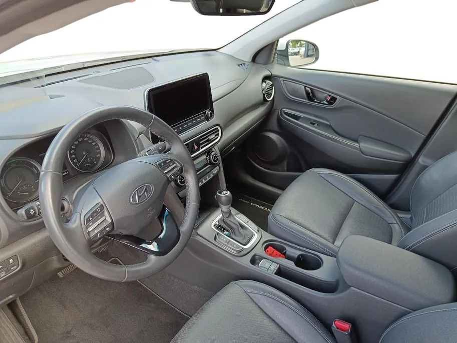 Hyundai Kona 1.6 GDI HEV Premium | Trekhaak | Apple Carplay/Android Auto | Adaptive cruise control | Dodenhoek herkenning | Leren bekleding
