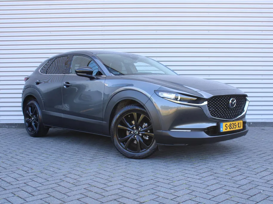 Mazda CX-30 2.0 e-SkyActiv-X M Hybrid Homura | Stoel-/stuurverwarming | Camera | 18' LM | LED | HUD | Dodehoek detectie | Elek. achterklep | Cruise adapt. |