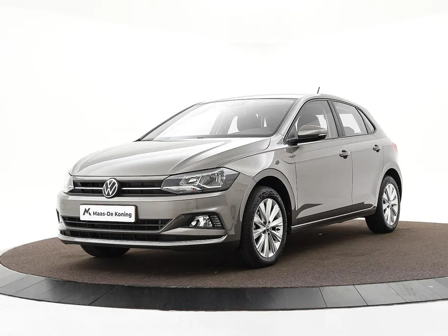 Volkswagen Polo 1.0 TSI 95pk Highline · Apple/Android Car Play · Navigatie · Clima · 16'Velgen · Sportstoelen · Draadloze Telefoonlader ·