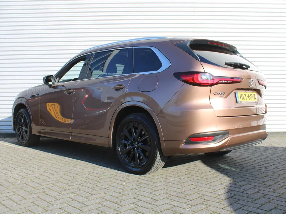 Mazda CX-80 2.5 e-SkyActiv PHEV Homura Plus | Trekhaak | Stuur-/stoelverwarming + ventilatie | 360 Camera | Schuifdak | Elek. stoelverst. | 20' LM | Leer | 7-zits |