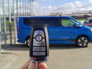 Ford Tourneo Custom E-Tourneo 340 L1H1 Sport 65 kWh - 8 PERSOONS - FULL OPTION - PANORAMADAK - ELEK. ZIJ SCHUIFDEUREN - TREKHAAK