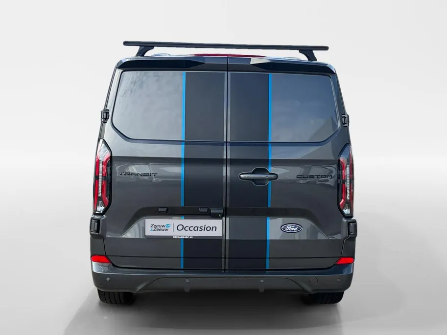 Ford Transit Custom 300 2.0 TDCI L2H1 Sport | Automaat | Adapt. Cruise control | BLIS | Winter pack | Elektr. bestuurdersstoel | Parkeersensoren voor en achter | Achteruitrijcamera | Navigatie | Apple carplay & Android auto | 18' lichtmetalen velgen | Bovag garantie |