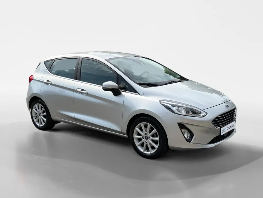 Ford Fiesta 1.0 EcoBoost Titanium | 1e Eigenaar | NL-Auto | Nieuwe distributieriem | Camera | Adaptive Cruisecontrol | Voorruitverwarming | B&O Audio | Navigatie | Apple Carplay&Android Auto | Climate Control | Dealer onderhouden |