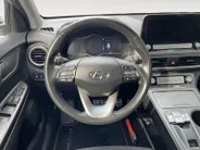 Hyundai Kona EV Comfort 64 kWh | Warmtepomp | 100% SOH | Adaptive cruise control | Apple Carplay & Android Auto | Achteruitrijcamera | Parkeersensoren achter | Keyless entry | DAB radio |