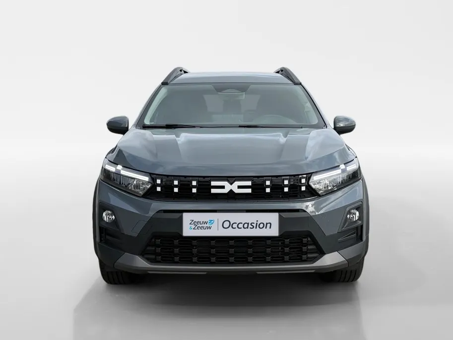 Dacia Jogger 155PK Hybrid Expression 7p. Automaat | DEMO | 7 Zitplaatsen | Camera | Parkeersensoren | Apple CarPlay/Android Auto | Cruise Control | Climate Control | Digital Cockpit | Armsteun | Licht & Regen Sensor |