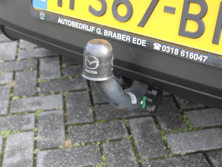 Mazda 2 1.5 Skyactiv-G GT-M | Trekhaak | Camera | Stoelverwarming | 16' LM | Navi | Cruise | Clima | Dodehoek detectie | LED | HUD |
