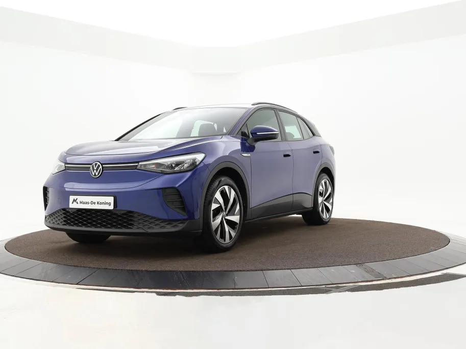 Volkswagen ID.4 Pro Business Advantage 77 kWh 204pk · SOH 95,8% · Inklap. Trekhaak · Warmtepomp · Stuur- & Stoelverwarming · 20'Velgen · ACC · Apple/Android Car Play ·