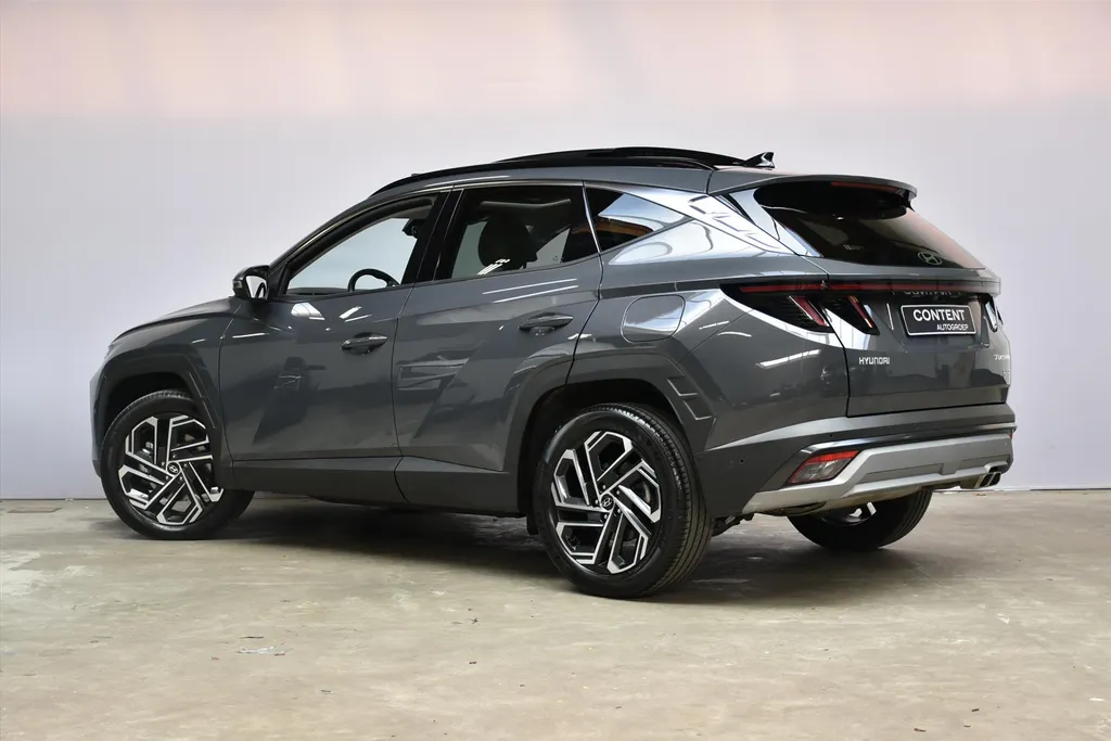 Hyundai Tucson 1.6 T-GDi HEV Aut. Premium Sky |Schuifdak |Beige Leder .