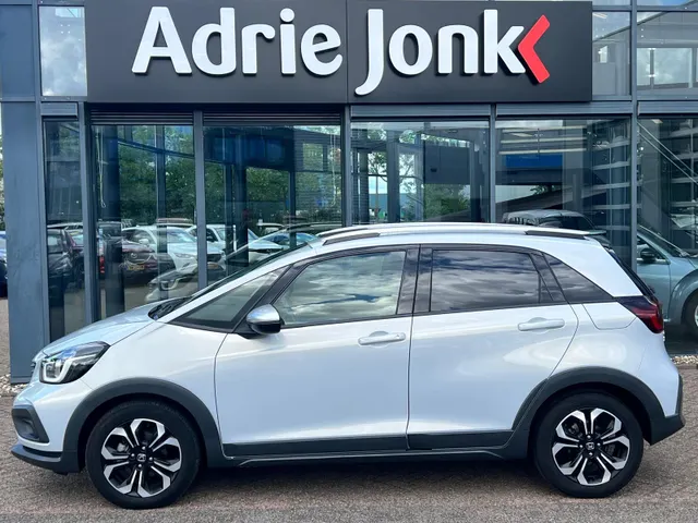Honda Jazz 1.5 e:HEV Crosstar AUTOMAAT | FULL HYBRID | CAMERA | NAVIGATIE | ADAPTIVE CRUISE CONTROLE | NED. AUTO | LAGE KM STAND 25.738km |