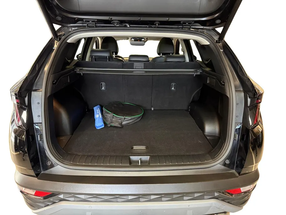 Hyundai Tucson 1.6 T-GDI PHEV Premium Sky 4WD | 66km WLTP elektrisch | Navigatie | Adaptive cruise control | Trekhaak | Apple Carplay & Android Auto | Dode hoek detectie | Draadloze telefoonlader |
