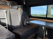 Renault Master T35 2.3 dCi 135 L3H2 Work Edition | Camper Edition | Motorsport Edition | Thule Omnistor Luifel | Airco in Leefruimte | TV | Koelkast | Magnetron | Volledig Bed | 2 Lederen Stoelen | DAB | LED Verlichting Leefruimte |