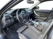 BMW 3 Serie Touring 316i Executive Sport NL Auto | unieke km.stand | navigatie | lm velgen | cruise | etc.