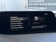Mazda 3 2.0 e-SkyActiv-G M Hybrid 122 Comfort met Bose | Apple Carplay / Android Auto | Navigatiesysteem | Licht + Regensensor | Elektrisch Verstelbare Bestuurderstoel  | Stoel + Stuurverwarming | Parkeersensoren Voor + Achter | Camera Achter | 18'Lichtmetalen ve
