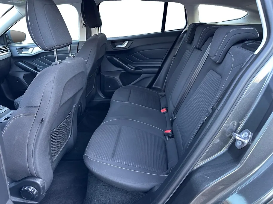 Ford Focus Wagon 1.0 EcoBoost Titanium Business | B&O | Adaptieve Cruise Control | Winter Pack | Privacy Glass | Navigatie | All weather banden