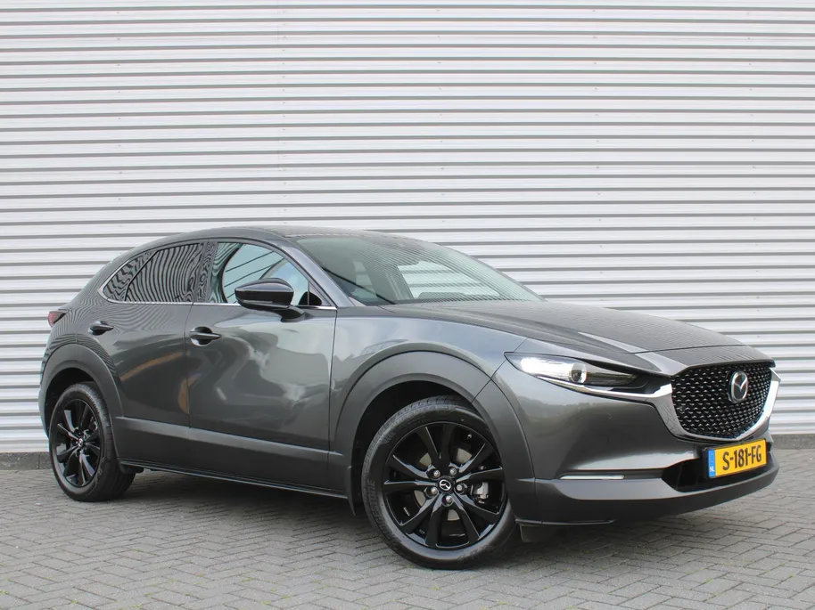 Mazda CX-30 2.0 e-SkyActiv-X M Hybrid Homura | 18' LM | Navi | Stoel-/stuurverwarming | Camera | Cruise adapt. | PDC | Dodehoek detectie | HUD | LED |