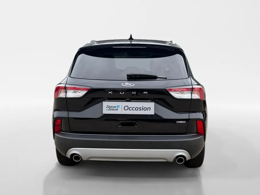 Ford Kuga 2.5 PHEV Titanium | Dealer Onderhouden | SOH 91% | El. Trekhaak | Adapt. Cruise Control | BLISS | Achteruitrijcamera | Parkeersensoren voor & achter | Winterpakket | All Season Banden