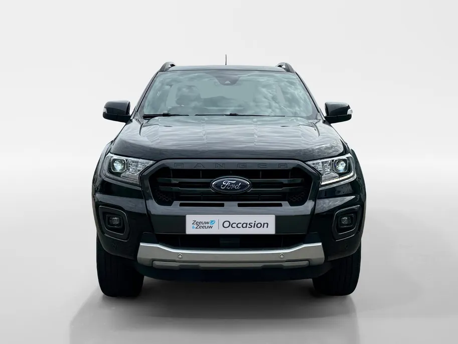 Ford Ranger 2.0 EcoBlue Wildtrak Supercab | NL auto | Dealer onderhouden | 213 pk | Trekhaak | Automaat | Rollertop | Stoelverwarming | Achteruitrijcamera | Parkeersensoren voor en achter | Adapt. cruise control | Apple carplay & Android auto | Bovag garantie |