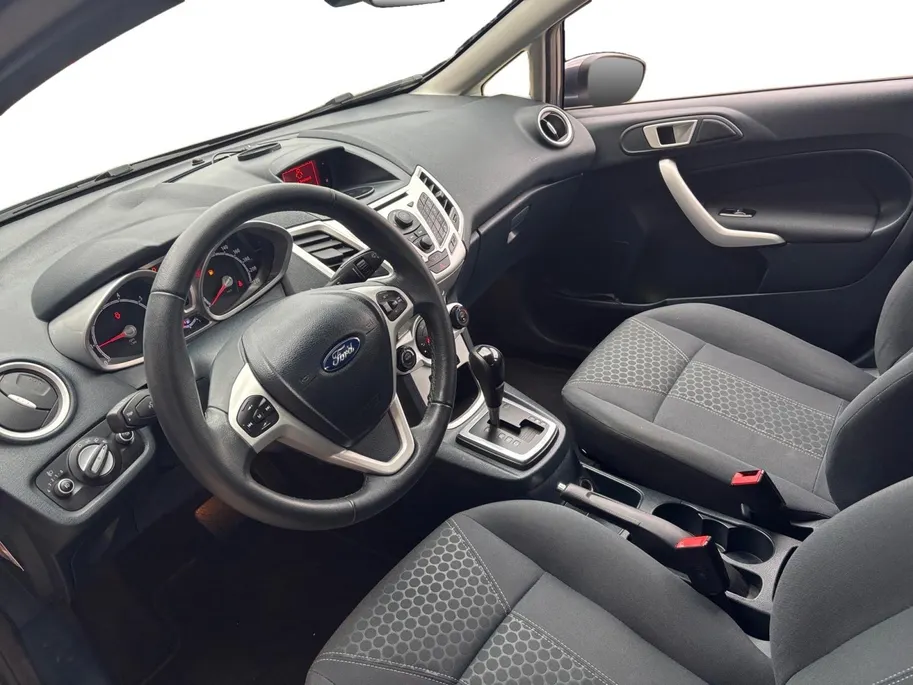 Ford Fiesta 1.4 Titanium | Voorruitverwarming | PDC | Airco | 12 maanden BOVAG garantie