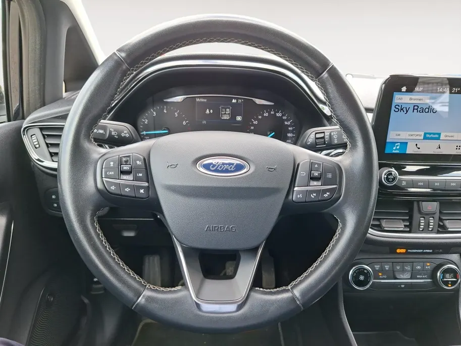 Ford Fiesta 1.0 EcoBoost Titanium | Dealeronderhouden | First edition pack | Adaptieve cruise control | Voorruitverwarming | Parkeer sensoren