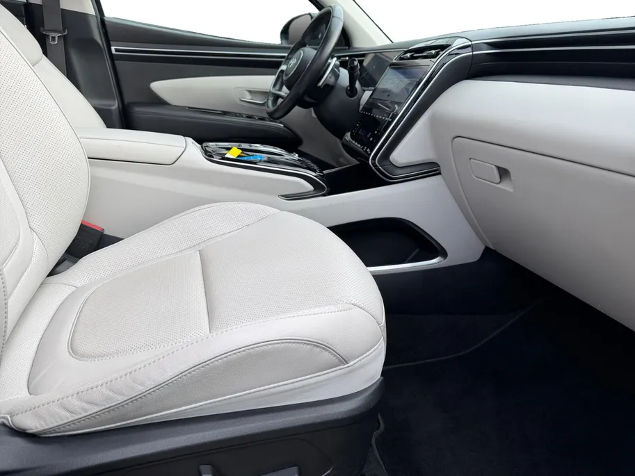 Hyundai Tucson 1.6 T-GDI PHEV Premium Sky 4WD | Zeer compleet | Open dak | Unieke bekleding | Trekhaak | 360 graden camera | Stoel koeling & verwarming |