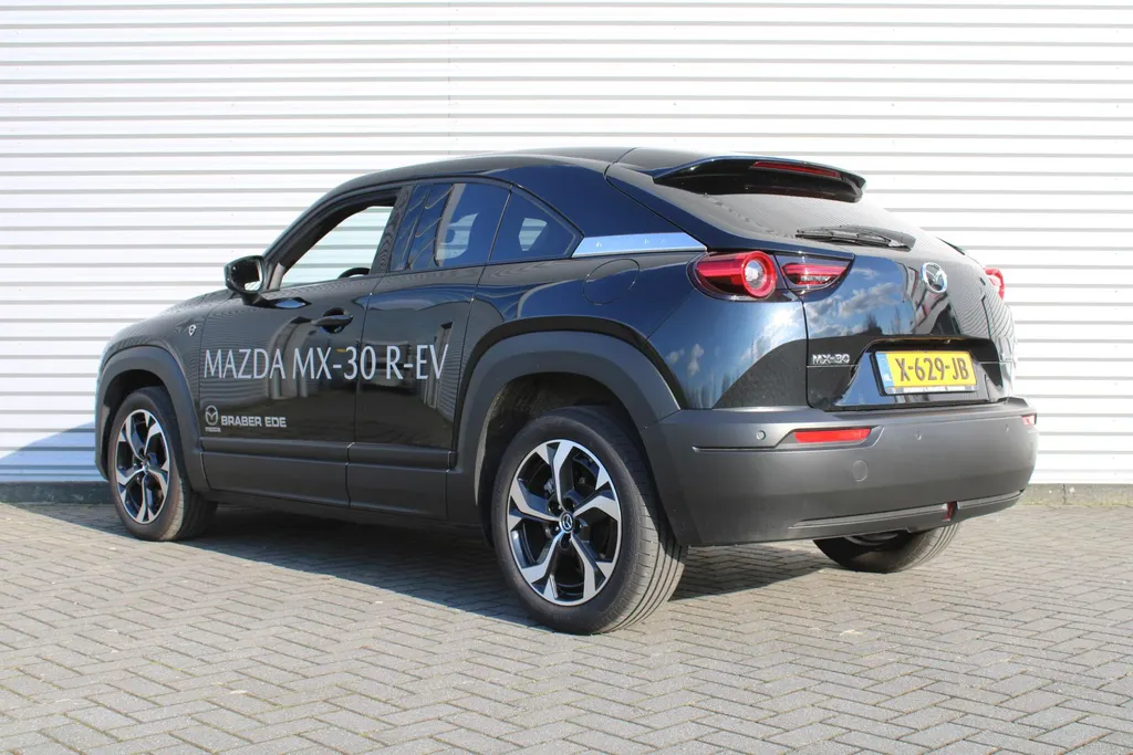Mazda MX-30 e-SkyActiv R-EV 170 Advantage Industrial | Stoelverwarming | HUD | Dodehoek detectie | Elek. stoelverstelling | LED | 18' LM | Camera |