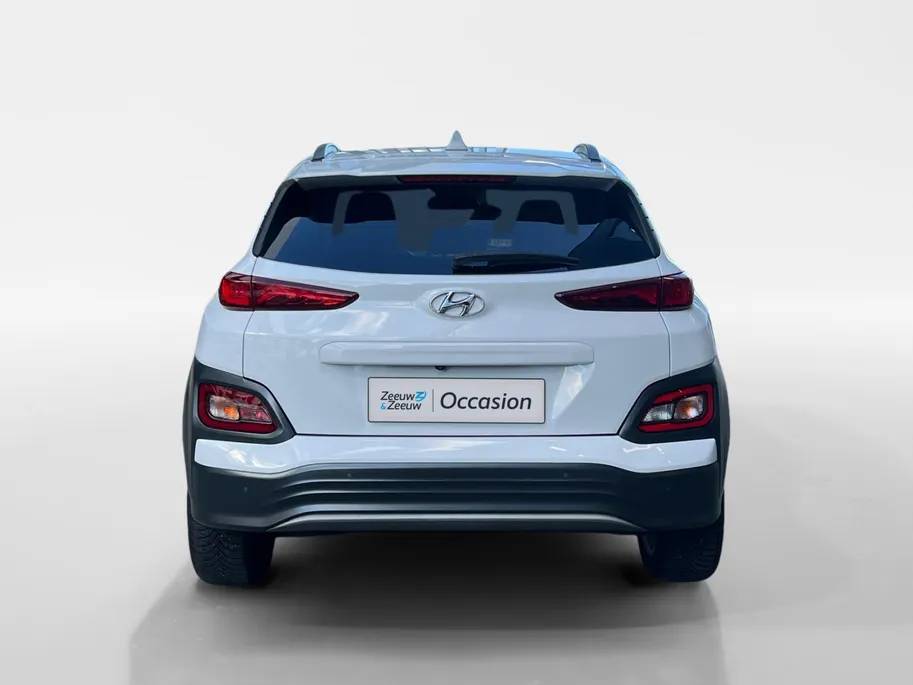Hyundai Kona EV Fashion 64 kWh | Warmtepomp | Navigatie | Apple Carplay & Android Auto | Adaptive cruise control | Open dak | Head-up display | Achteruitrijcamera |