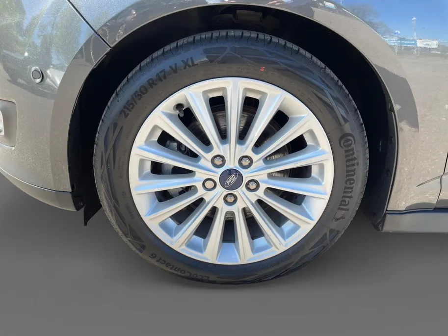 Ford Grand C-Max 1.0 Titanium 7Pers. | Navigatie | Voorruitverwarming | Stoelverwarming | Privacy Glass | Cruise Control | 17|  Velgen | Parkeersensoren voor en achter | Parkeerassistent | Zonneschermen
