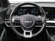 Kia Sportage 1.6 T-GDi Hybrid Dark Edition | Stuur-/stoelverwarming v+a | Camera | Elek. stoelverstelling | 18' LM | Cruise adapt. | Navi | Clima | Half leer/suède |