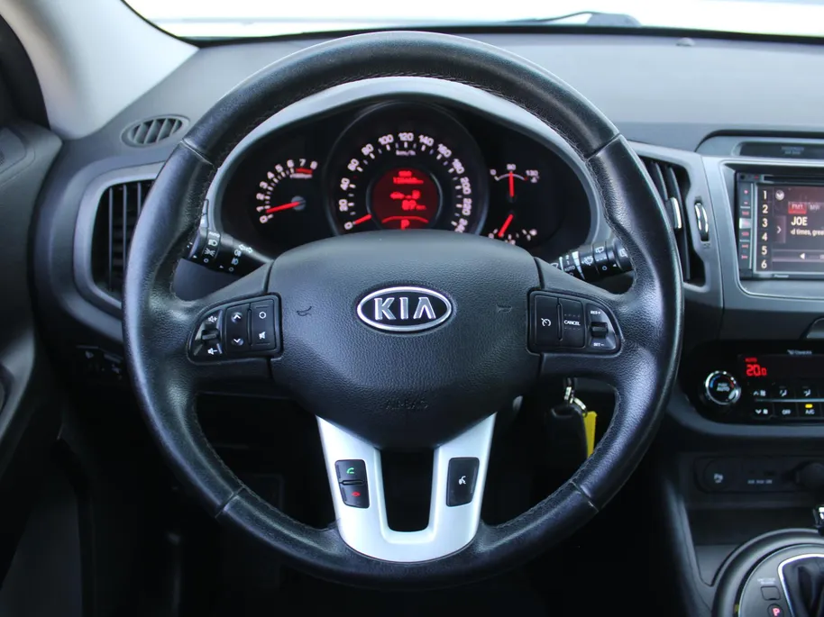 Kia Sportage 2.0 X-ecutive Plus Pack | Trekhaak | 17' LM | Parkeersensor achter | Half leer/stof | Navi Pioneer incl. Apple CarPlay/Android Auto | Cruise | Clima | Automaat |