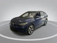 Volkswagen ID.4 Pro Business Advantage 77 kWh 204pk · SOH 95,8% · Inklap. Trekhaak · Warmtepomp · Stuur- & Stoelverwarming · 20'Velgen · ACC · Apple/Android Car Play ·