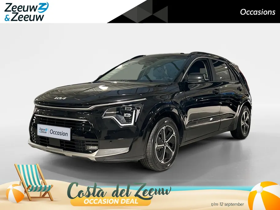 Kia Niro 1.6 GDi Hybrid DynamicPlusLine | Navigatiesysteem | Apple Carplay / Android Auto | Licht + Regensensor | Stoel + Stuurverwarming| Elektrisch bedienbaar Schuifdak | Elektrische Achterklep | Parkeersensoren Voor + Achter | Cruise Control Adaptief | Rijstroo