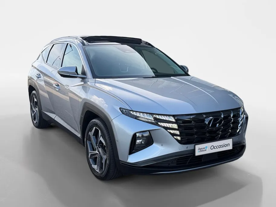 Hyundai Tucson 1.6 T-GDI PHEV Premium Sky 4WD | SOH 89,6%| Zeer nette auto | Zeer compleet | Open dak | Dealer onderhouden | 62 km range |
