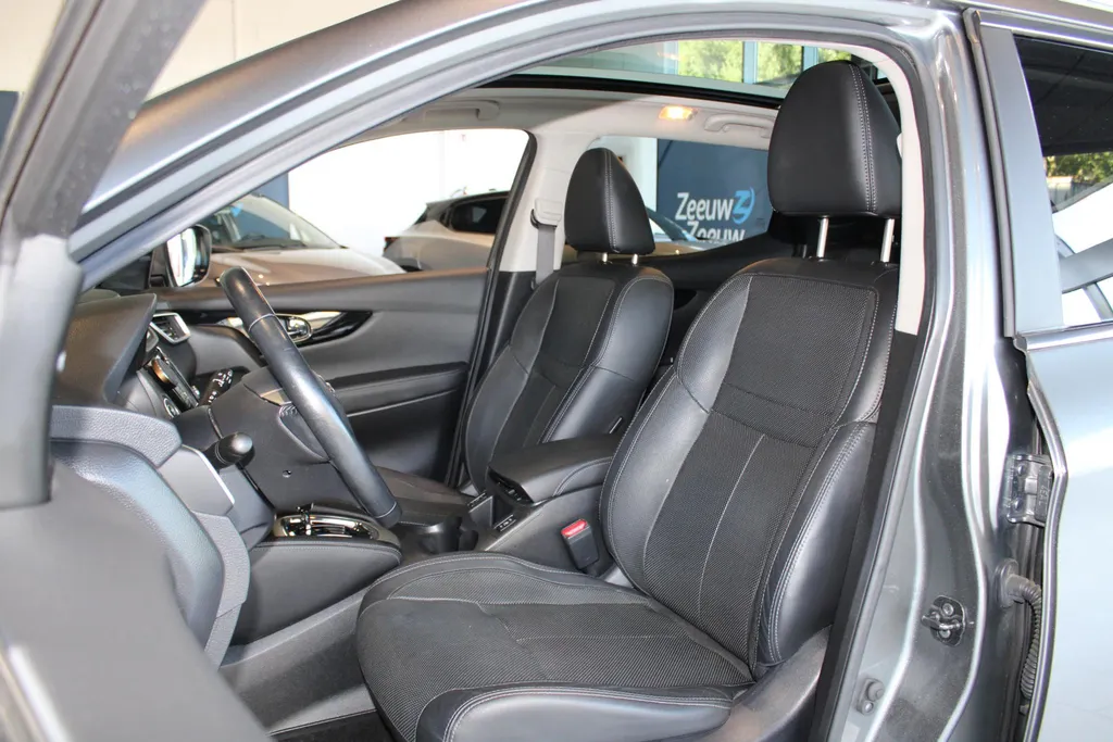 Nissan QASHQAI 1.2 Tekna | Automaat | Lederen bekleding | Electrische Stoel verstelling | 360grd camera | Parkeersensoren voor en achter | Dodehoek sensoren | Nette auto met weinig kilometers | Stoel verwarming |