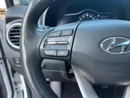 Hyundai Kona EV Fashion 64 kWh 204PK | Warmtepomp | Navigatie | Apple Carplay & Android Auto | Adaptive cruise control | Open dak | Head-up display | Achteruitrijcamera |