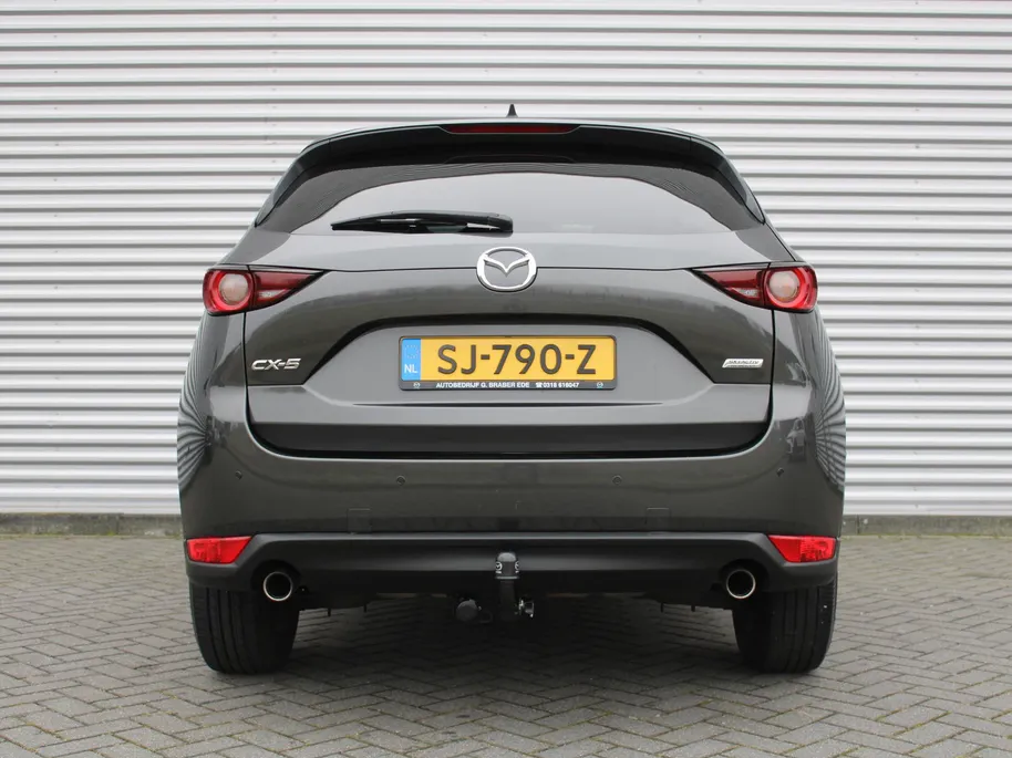 Mazda CX-5 2.0 SkyActiv-G 165 Skylease | Trekhaak | 17' LM | Navi | Apple Carplay/Android Auto | Parkeersensor achter | LED | Cruise | All season | Dealeronderhouden |