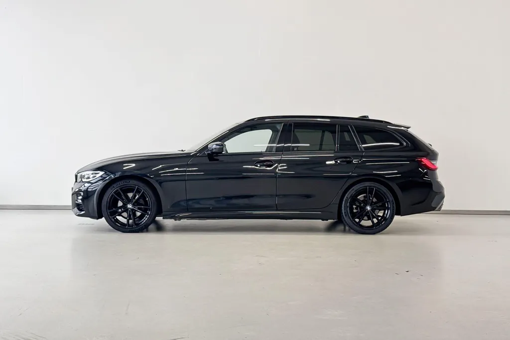 BMW 3 Serie Touring 320i High Executive Edition Model M Sport