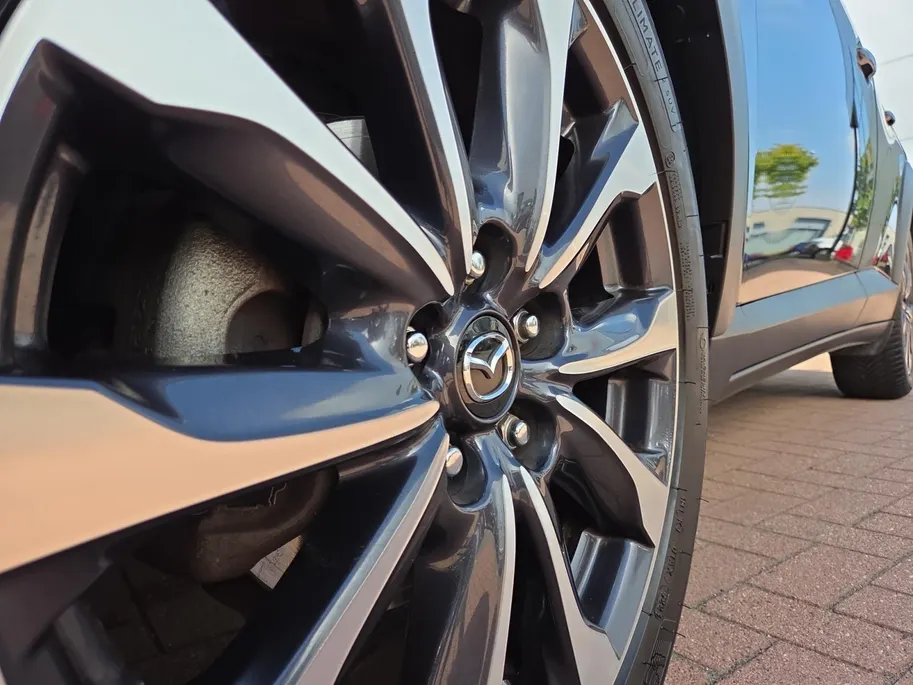 Mazda CX-3 2.0 SkyActiv-G 121 Sportive | Trekhaak | Achteruitrijcamera + Dashcam voor en achter | Navigatie | stoelverwarming | Cruise Control | Carplay | LM Velgen | 12 Maanden BOVAG Garantie |