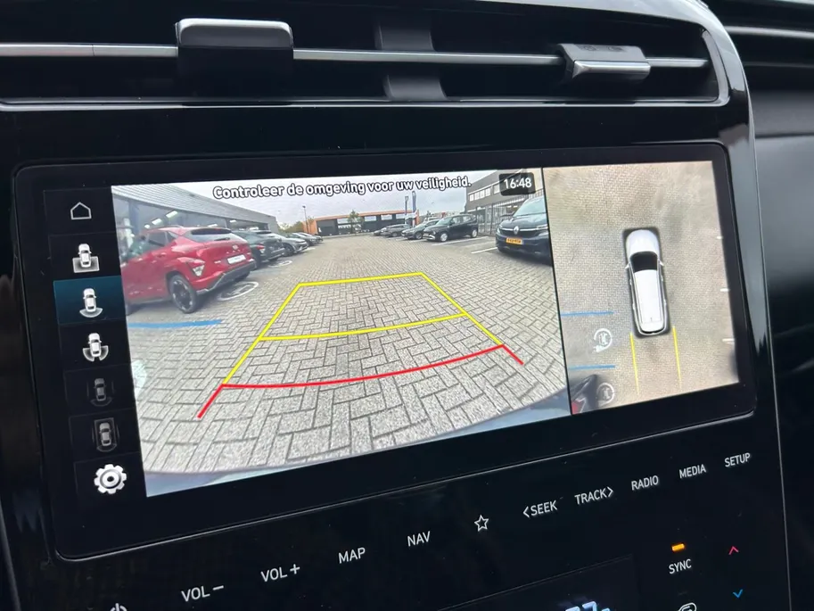 Hyundai Tucson 1.6 T-GDI HEV Premium Sky + Winterbanden! | 1650kg trekgewicht | Navi | 360 Camera | Stoel+ stuurverwarming | Elek. stoelverstelling