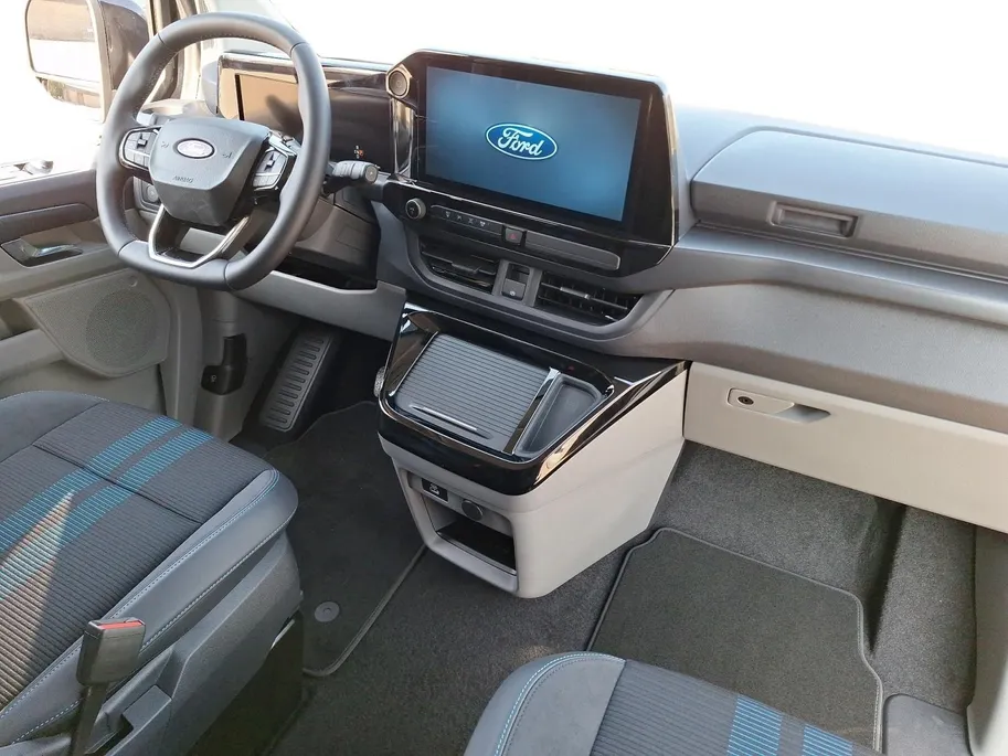Ford E-Transit Custum 320 L1H1 Sport 71 kWh DC | Dubbele Schuideur | Camera | Trekhaak | 17' Lichtmetaal | Halfleer bekleed | Led verlichting | El. Verst. bestuurdersstoel| Apple Carplay&Android Auto |
